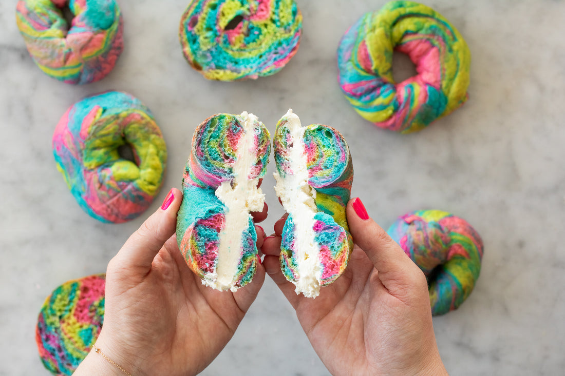 Rainbow bagel cut in half