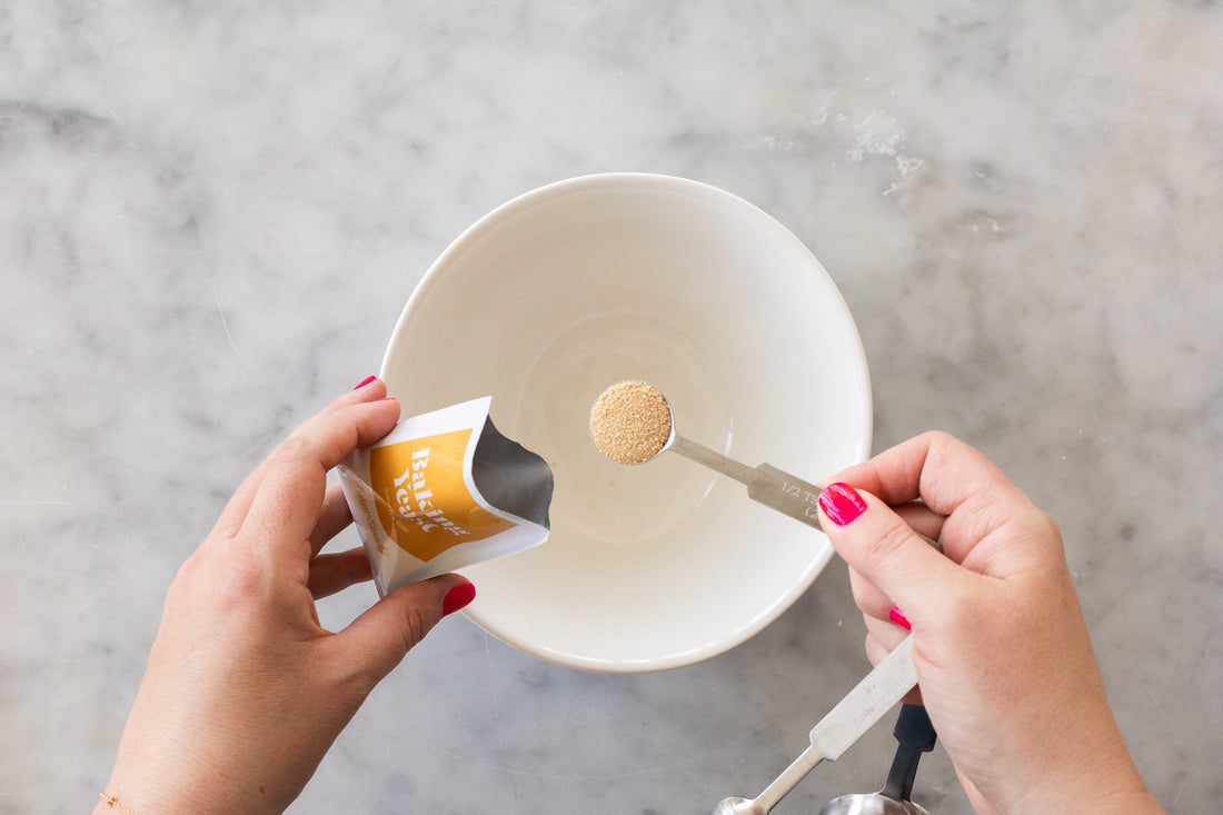 Adding yeast to bowl