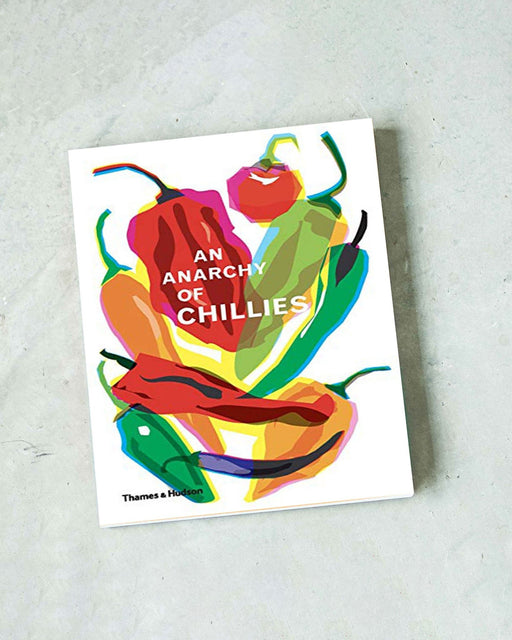 An Anarchy of Chillies by Caz Hildebrand on concrete